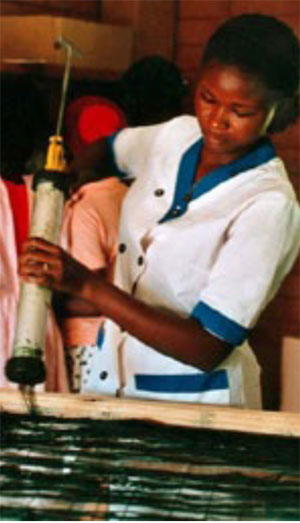 Woman working at spirulina farm
